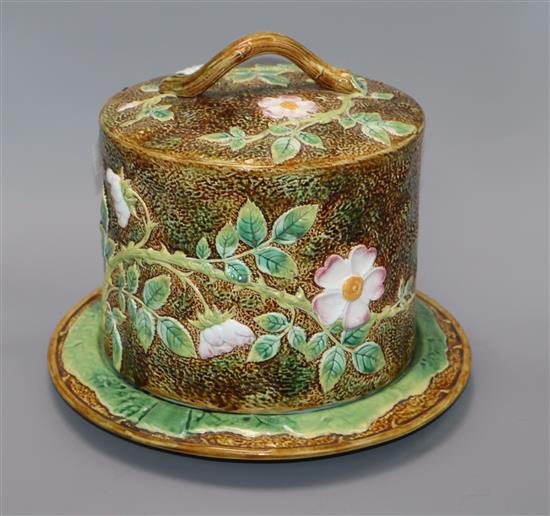 A George Jones majolica wild rose pattern cheese dome on stand height 26cm